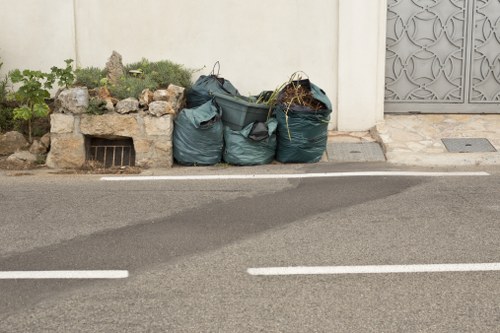 Garden debris being removed during clearance